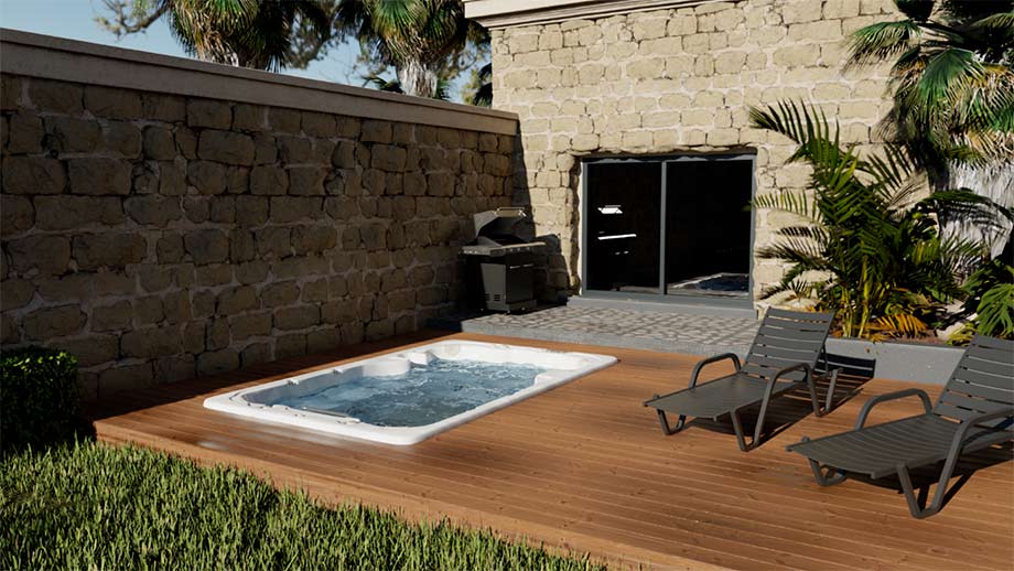 Un spa de nage est installé sur une grande terrasse en bois. La taille réduite du spa de nage permet au propriétaire de se réapproprier son jardin. Sur la terrasse, il a pu installer deux chaises longues à côté de son spa de nage.