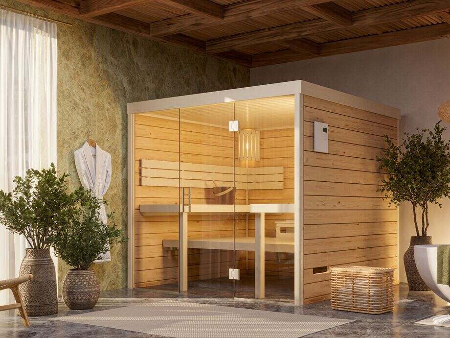 Un sauna traditionnel est installé en intérieur, dans une pièce à vivre. 