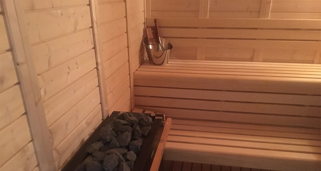 Zoom sur le four d'un sauna Panneaux Massif.