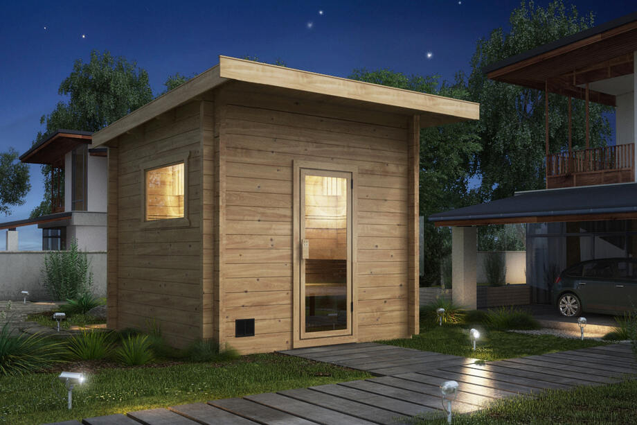 Un sauna à toit plat est installé dans un jardin. 